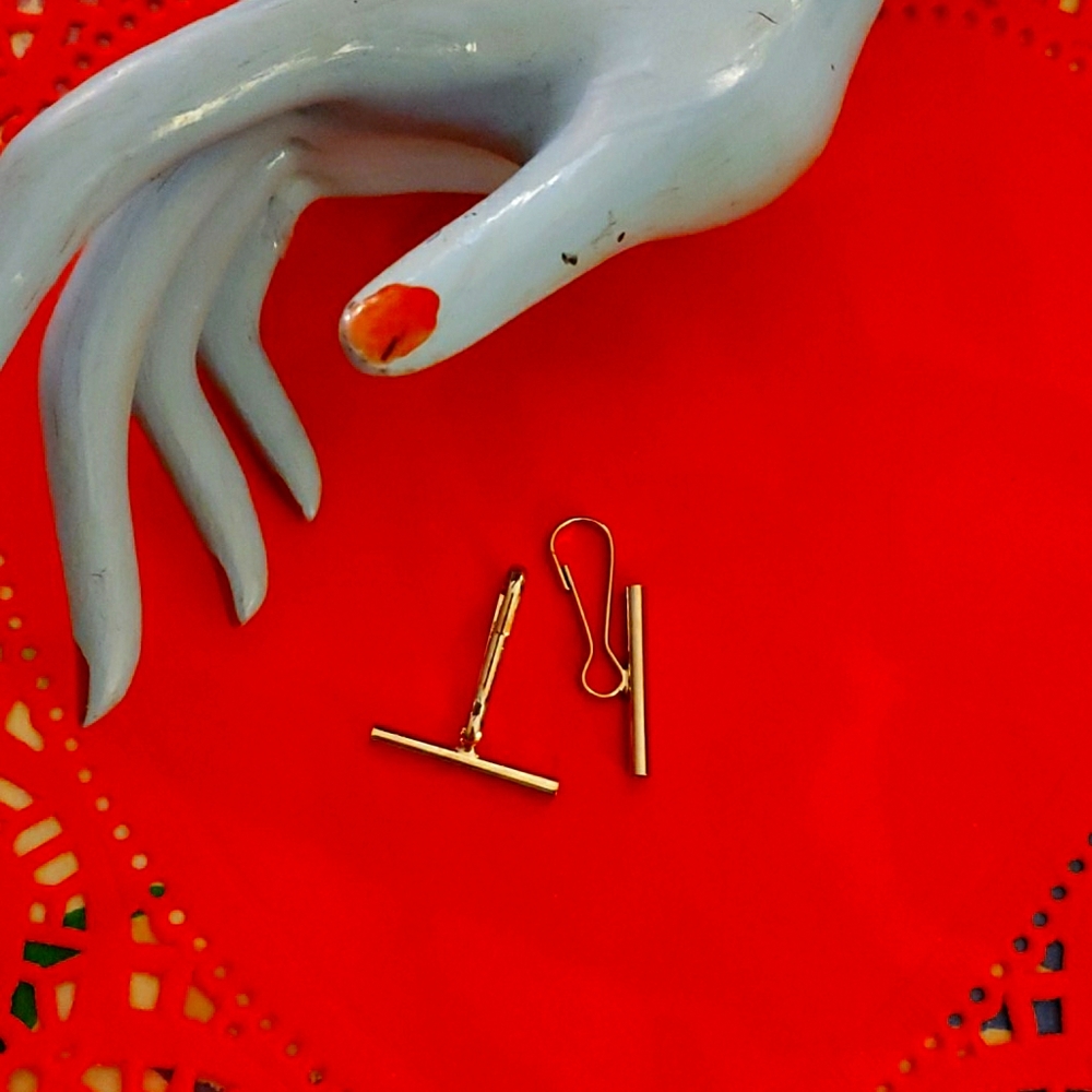 Lipstick and chrome  pendant pin holders.